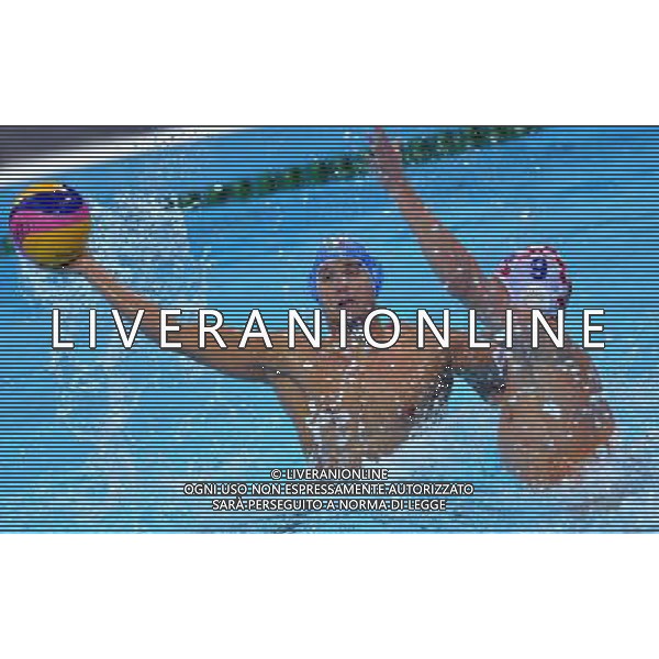 (120812) -- LONDON, Aug. 12, 2012 () -- A player of Italy (L) shoots during men\'s water polo gold medal match between Croatia and Italy at London 2012 Olympic Games in London, Britain, August 12, 2012. Croatia won the match and claimed the gold medal of the event. Italy won the silver medal of the event. (/Chen Xiaowei) ITALY ONLY - GIOCHI OLIMPICI, OLIMPIADI LONDRA 2012