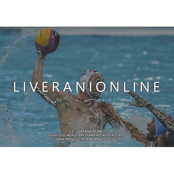 (120812) -- LONDON, Aug. 12, 2012 () -- Paulo Obradovic of Croatia is challenged during men\'s water polo gold medal match between Croatia and Italy at London 2012 Olympic Games in London, Britain, August 12, 2012. Croatia won the match and claimed the gold medal of the event. (/Yang Lei) ITALY ONLY - GIOCHI OLIMPICI, OLIMPIADI LONDRA 2012