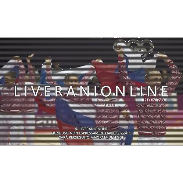 (120812) -- LONDON, Aug. 12, 2012 () -- The Russian team celebrates after the Group All-Around competition of Gymnastics Rhythmic event, at London 2012 Olympic Games in London, Britain, on August 12, 2012. The Russian team won gold medal. (/Fei Maohua) (nxl) ©PHOTOSHOT/AGENZIA ALDO LIVERANI SAS - ITALY ONLY - GIOCHI OLIMPICI, OLIMPIADI LONDRA 2012