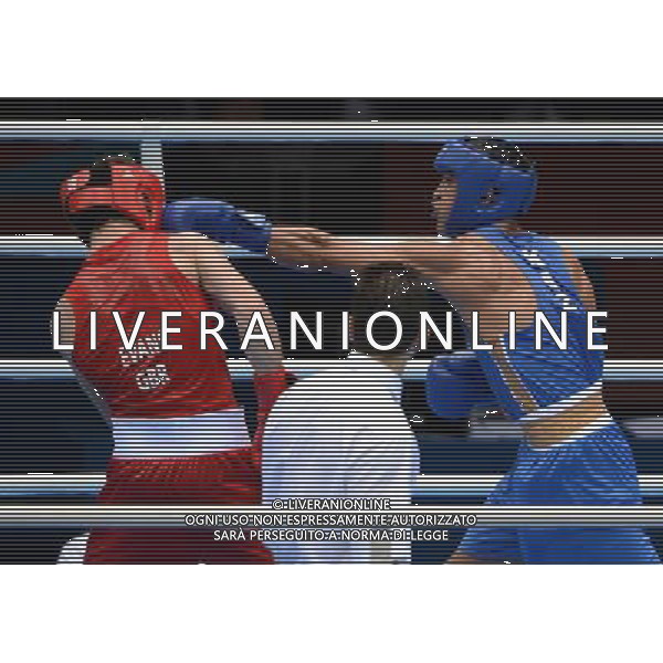 (120812) -- LONDON, Aug. 12, 2012 () -- Serik Sapiyev of Kazakhstan (in blue) fights with Freddie Evans of Britain during men\'s boxing welter (69kg) gold medal contest, at London 2012 Olympic Games in London, Britain, on August 12, 2012. Serik Sapiyev of Kazakhstan won gold medal. (/Guo Yong) (nxl) ©PHOTOSHOT/AGENZIA ALDO LIVERANI SAS - ITALY ONLY - GIOCHI OLIMPICI, OLIMPIADI LONDRA 2012