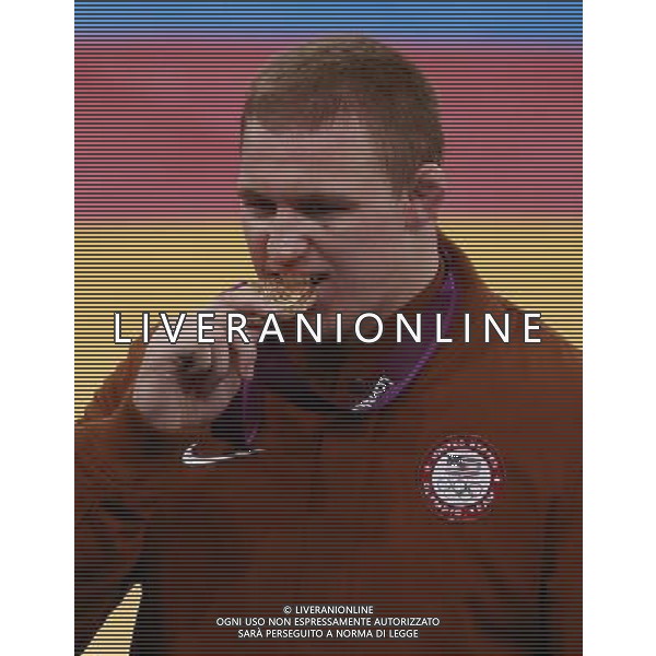 (120812) -- LONDON, Aug. 12, 2012 () -- Jacob Stephen Varner of USA attends victory ceremony of men\'s wrestling freestyle 96kg contest, at London 2012 Olympic Games in London, Britain, on August 12, 2012. Jacob Stephen Varner of USA won gold medal. (/Ren Zhenglai) (nxl) ©PHOTOSHOT/AGENZIA ALDO LIVERANI SAS - ITALY ONLY - GIOCHI OLIMPICI, OLIMPIADI LONDRA 2012