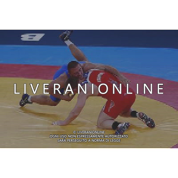 (120812) -- LONDON, Aug. 12, 2012 () -- Jacob Stephen Varner of USA (in red) competes with Valerii Andriitsev of Ukraine during men\'s wrestling freestyle 96kg gold medal contest, at London 2012 Olympic Games in London, Britain, on August 12, 2012. Jacob Stephen Varner of USA won gold medal. (/Ren Zhenglai) (nxl) ©PHOTOSHOT/AGENZIA ALDO LIVERANI SAS - ITALY ONLY - GIOCHI OLIMPICI, OLIMPIADI LONDRA 2012