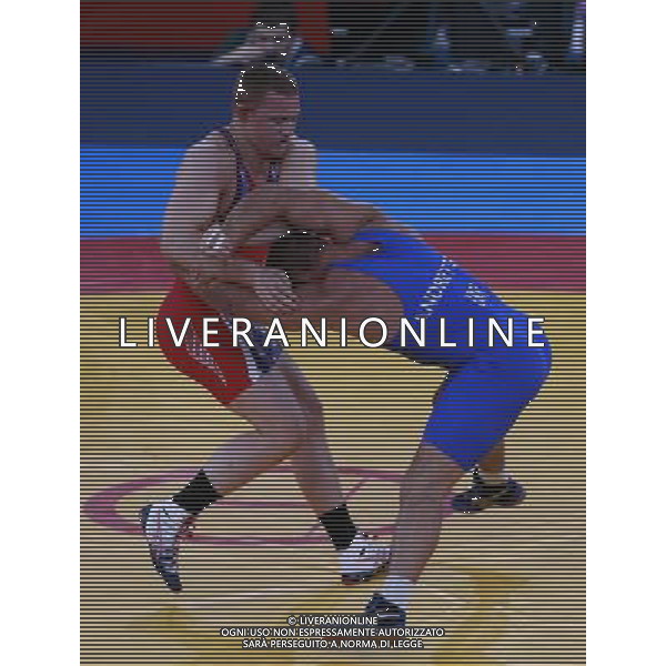 (120812) -- LONDON, Aug. 12, 2012 () -- Jacob Stephen Varner of USA (in red) competes with Valerii Andriitsev of Ukraine during men\'s wrestling freestyle 96kg gold medal contest, at London 2012 Olympic Games in London, Britain, on August 12, 2012. Jacob Stephen Varner of USA won gold medal. (/Ren Zhenglai) (nxl) ©PHOTOSHOT/AGENZIA ALDO LIVERANI SAS - ITALY ONLY - GIOCHI OLIMPICI, OLIMPIADI LONDRA 2012