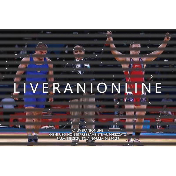 (120812) -- LONDON, Aug. 12, 2012 () -- Jacob Stephen Varner of USA (in red) celebrates after defeating Valerii Andriitsev of Ukraine during men\'s wrestling freestyle 96kg gold medal contest, at London 2012 Olympic Games in London, Britain, on August 12, 2012. Jacob Stephen Varner of USA won gold medal. (/Jin Liwang) (nxl) ©PHOTOSHOT/AGENZIA ALDO LIVERANI SAS - ITALY ONLY - GIOCHI OLIMPICI, OLIMPIADI LONDRA 2012