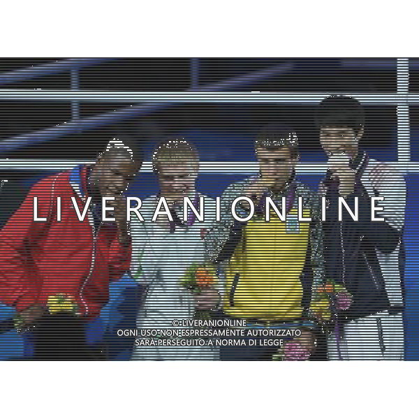 (120812) -- LONDON, Aug. 12, 2012 () -- Gold medalist Vasyl Lomachenko of Ukraine (2nd R), silver medalist Han Soonchul of South Korea (1st R) and bronze medalists Yasniel Toledo Lopez of Cuba (1st L) and Evaldas Petrauskas of Lithuania attend victory ceremony of men\'s boxing light (60kg) contest, at London 2012 Olympic Games in London, Britain, on August 12, 2012. Vasyl Lomachenko of Ukraine won gold medal. (/Wang Shen) (nxl) ©PHOTOSHOT/AGENZIA ALDO LIVERANI SAS - ITALY ONLY - GIOCHI OLIMPICI, OLIMPIADI LONDRA 2012
