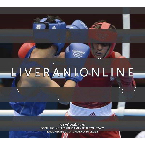 (120812) -- LONDON, Aug. 12, 2012 () -- Vasyl Lomachenko of Ukraine (in red) fights with Han Soonchul of South Korea in men\'s boxing light (60kg) gold medal contest, at London 2012 Olympic Games in London, Britain, on August 12, 2012. Vasyl Lomachenko of Ukraine won gold medal. (/Guo Yong) (nxl) ©PHOTOSHOT/AGENZIA ALDO LIVERANI SAS - ITALY ONLY - GIOCHI OLIMPICI, OLIMPIADI LONDRA 2012