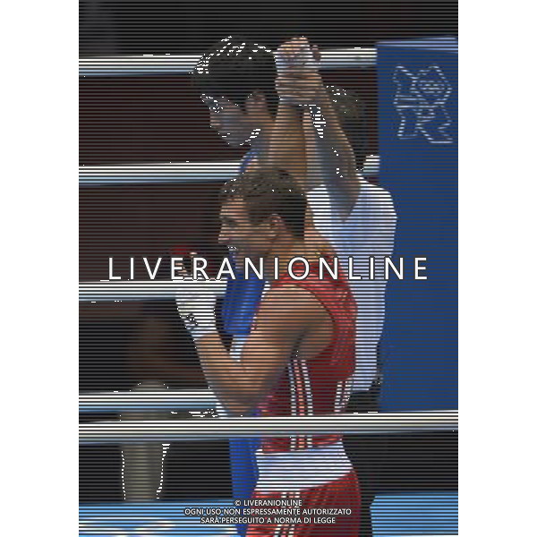 (120812) -- LONDON, Aug. 12, 2012 () -- Vasyl Lomachenko of Ukraine (in red) celebrates after defeating Han Soonchul of South Korea in men\'s boxing light (60kg) gold medal contest, at London 2012 Olympic Games in London, Britain, on August 12, 2012. Vasyl Lomachenko of Ukraine won gold medal. (/Guo Yong) (nxl) ©PHOTOSHOT/AGENZIA ALDO LIVERANI SAS - ITALY ONLY - GIOCHI OLIMPICI, OLIMPIADI LONDRA 2012