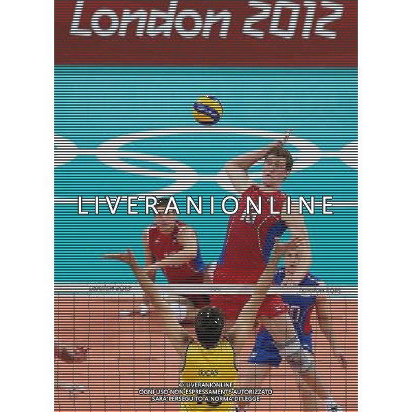 (120812) -- LONDON, Aug. 12, 2012 () -- Players compete in men\'s volleyball gold medal match between Russia and Brazil, at London 2012 Olympic Games in London, Britain, on August 12, 2012. (/Fan Jun) (nxl) ©PHOTOSHOT/AGENZIA ALDO LIVERANI SAS - ITALY ONLY - GIOCHI OLIMPICI, OLIMPIADI LONDRA 2012