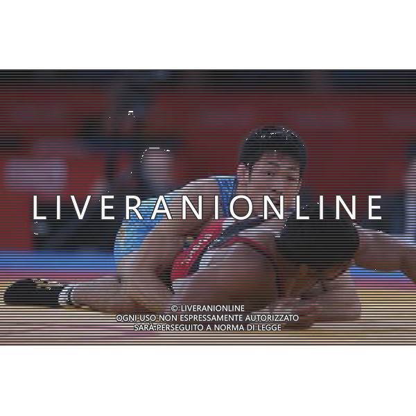 (120812) -- LONDON, Aug. 12, 2012 () -- Tatsuhiro Yonemitsu of Japan (in blue) competes with Sushil Kumar of India during men\'s boxing freestyle 66kg gold medal competition, at London 2012 Olympic Games in London, Britain, on August 12, 2012. Tatsuhiro Yonemitsu of Japan won gold medal. (/Jin Liwang) (nxl) ©PHOTOSHOT/AGENZIA ALDO LIVERANI SAS - ITALY ONLY - GIOCHI OLIMPICI, OLIMPIADI LONDRA 2012