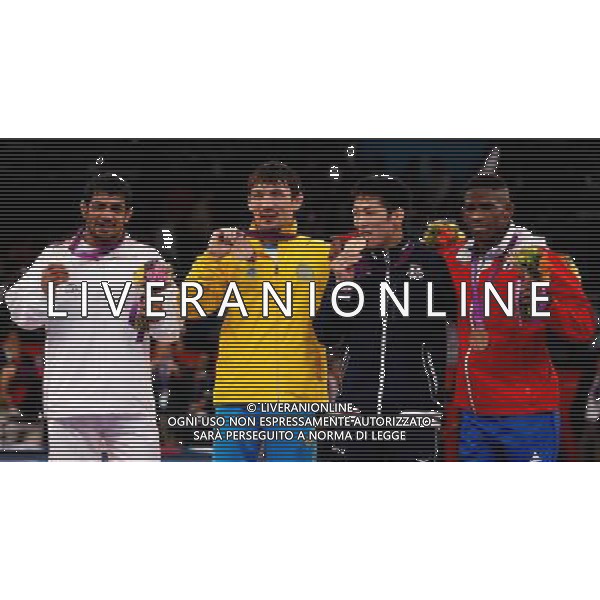 (120812) -- LONDON, Aug. 12, 2012 () -- Gold medalist Tatsuhiro Yonemitsu of Japan (2nd R), silver medalist Sushil Kumar of India (1st L) and bronze medalists Akzhurek Tanatarov of Kazakhstan (2nd L) and Livan Lopez Azcuy of Cuba attend victory ceremony of men\'s boxing freestyle 66kg competition, at London 2012 Olympic Games in London, Britain, on August 12, 2012. (/Jin Liwang) (nxl) ©PHOTOSHOT/AGENZIA ALDO LIVERANI SAS - ITALY ONLY - GIOCHI OLIMPICI, OLIMPIADI LONDRA 2012
