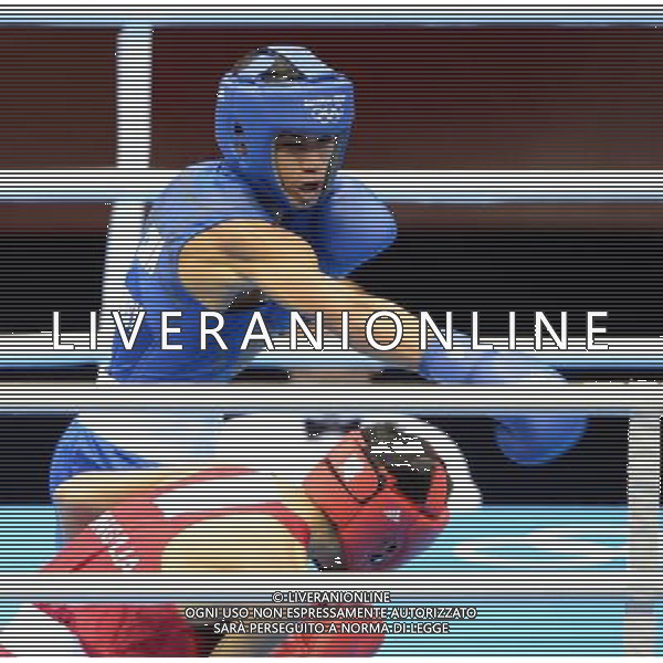 (120812) -- LONDON, Aug. 12, 2012 () -- Robeisy Ramirez Carrazana of Cuba (in blue) competes with Tugstsogt Nyambayar of Mongolia in men\'s boxing fly (52kg) gold medal competition, at London 2012 Olympic Games in London, Britain, on August 12, 2012. Robeisy Ramirez Carrazana of Cuba won gold medal. (/Guo Yong) (nxl) ©PHOTOSHOT/AGENZIA ALDO LIVERANI SAS - ITALY ONLY - GIOCHI OLIMPICI, OLIMPIADI LONDRA 2012
