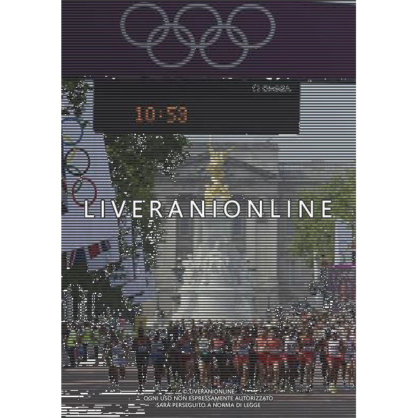 (120812) -- LONDON, Aug. 12, 2012 () -- Athletes compete in men\'s marathon competition, at London 2012 Olympic Games in London, Britain, on August 12, 2012. Stephen Kiprotich of Uganda won gold medal. (/Qi Heng) (nxl) ©PHOTOSHOT/AGENZIA ALDO LIVERANI SAS - ITALY ONLY - GIOCHI OLIMPICI, OLIMPIADI LONDRA 2012