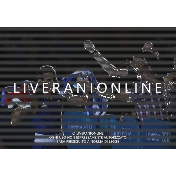 (120812) -- LONDON, Aug. 12, 2012 () -- Robeisy Ramirez Carrazana of Cuba (in blue) celebrates after defeating Tugstsogt Nyambayar of Mongolia in men\'s boxing fly (52kg) gold medal competition, at London 2012 Olympic Games in London, Britain, on August 12, 2012. Robeisy Ramirez Carrazana of Cuba won gold medal. (/Wang Shen) (nxl) ©PHOTOSHOT/AGENZIA ALDO LIVERANI SAS - ITALY ONLY - GIOCHI OLIMPICI, OLIMPIADI LONDRA 2012