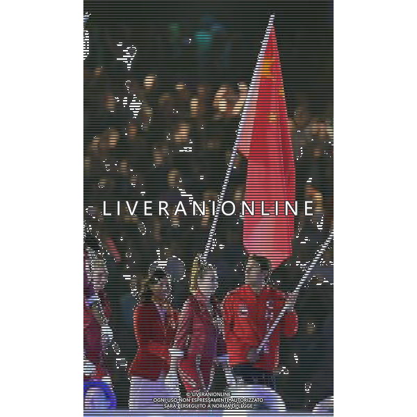 (120812) -- LONDON, Aug. 12, 2012 () -- Photo taken on August 12, 2012 shows Chinese national flag bearer Xu Lijia (2nd L) carries the flag during the closing ceremony of the London 2012 Olympic Games at the Olympic Stadium in London, Britain. (/Fan Jun) (lm) ©PHOTOSHOT/AGENZIA ALDO LIVERANI SAS - ITALY ONLY - CERIMONIA DI CHIUSURA DEI GIOCHI OLIMPICI, OLIMPIADI LONDRA 2012