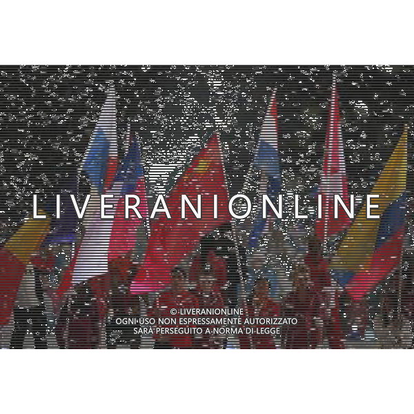 (120812) -- LONDON, Aug. 12, 2012 () -- Photo taken on August 12, 2012 shows Chinese national flag bearer Xu Lijia (3rd R) carries the flag during the closing ceremony of the London 2012 Olympic Games at the Olympic Stadium in London, Britain. (/Wang Shen) (lm) ©PHOTOSHOT/AGENZIA ALDO LIVERANI SAS - ITALY ONLY - CERIMONIA DI CHIUSURA DEI GIOCHI OLIMPICI, OLIMPIADI LONDRA 2012
