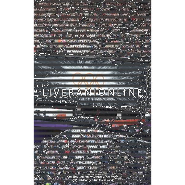 (120812) -- LONDON, Aug. 12, 2012 () -- Spectators enter the Olympic Stadium for the Closing Ceremony of the London 2012 Olympic Games in London, Britain, August 12, 2012. (/Wang Qingqin) (zgp) ©PHOTOSHOT/AGENZIA ALDO LIVERANI SAS - ITALY ONLY - CERIMONIA DI CHIUSURA DEI GIOCHI OLIMPICI, OLIMPIADI LONDRA 2012