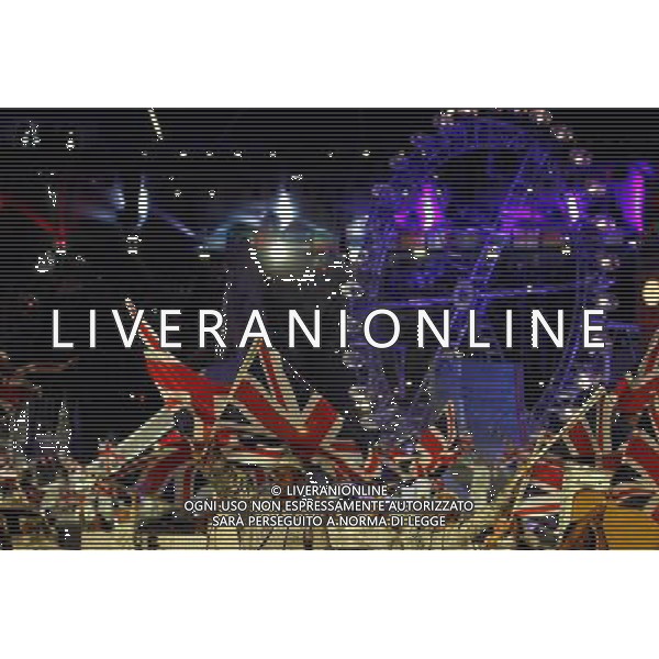 (120812) -- LONDON, Aug. 12, 2012 () -- Photo taken on August 12, 2012 shows the performers wave the British flags during the closing ceremony of the London 2012 Olympic Games at the Olympic Stadium in London, Britain. (/Jin Liwang) (lm) ©PHOTOSHOT/AGENZIA ALDO LIVERANI SAS - ITALY ONLY - CERIMONIA DI CHIUSURA DEI GIOCHI OLIMPICI, OLIMPIADI LONDRA 2012