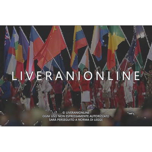 (120812) -- LONDON, Aug. 12, 2012 () -- Photo taken on August 12, 2012 shows Chinese national flag bearer Xu Lijia (front 5th R) carries the flag during the closing ceremony of the London 2012 Olympic Games at the Olympic Stadium in London, Britain. (/Jin Liwang) (lm) ©PHOTOSHOT/AGENZIA ALDO LIVERANI SAS - ITALY ONLY - CERIMONIA DI CHIUSURA DEI GIOCHI OLIMPICI, OLIMPIADI LONDRA 2012