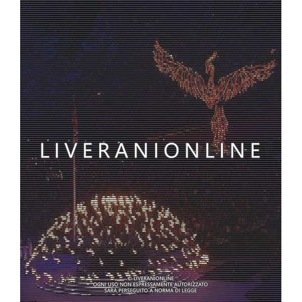 (120812) -- LONDON, Aug. 12, 2012 () -- Photo taken on August 12, 2012 shows the Olympic flame and a phenix made of light at the Closing Ceremony of the London 2012 Olympic Games at the Olympic Stadium in London, Britain. (/Wang Qingqin) (zgp) ©PHOTOSHOT/AGENZIA ALDO LIVERANI SAS - ITALY ONLY - CERIMONIA DI CHIUSURA DEI GIOCHI OLIMPICI, OLIMPIADI LONDRA 2012