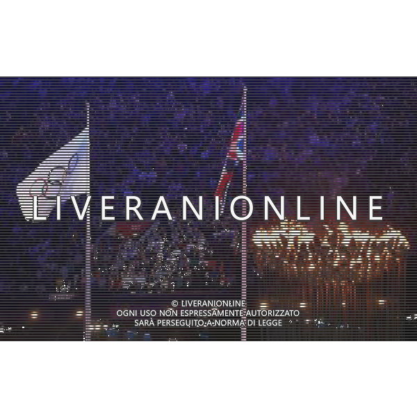 (120812) -- LONDON, Aug. 12, 2012 () -- Photo taken on August 12, 2012 shows the Olympic Flag being lowered at the Closing Ceremony of the London 2012 Olympic Games at the Olympic Stadium in London, Britain, August 12, 2012. (/Fan Jun) (zgp) ©PHOTOSHOT/AGENZIA ALDO LIVERANI SAS - ITALY ONLY - CERIMONIA DI CHIUSURA DEI GIOCHI OLIMPICI, OLIMPIADI LONDRA 2012