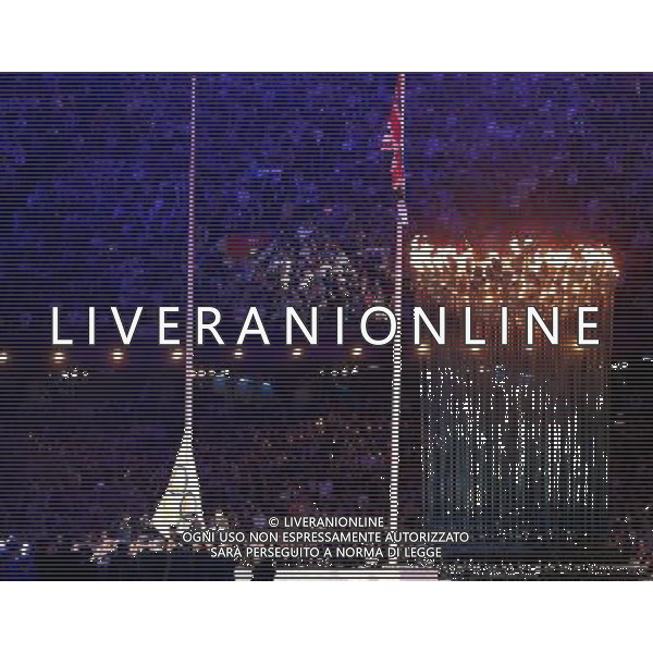 (120812) -- LONDON, Aug. 12, 2012 () -- Photo taken on August 12, 2012 shows the Olympic Flag being lowered at the Closing Ceremony of the London 2012 Olympic Games at the Olympic Stadium in London, Britain. (/Fan Jun) (zgp) ©PHOTOSHOT/AGENZIA ALDO LIVERANI SAS - ITALY ONLY - CERIMONIA DI CHIUSURA DEI GIOCHI OLIMPICI, OLIMPIADI LONDRA 2012