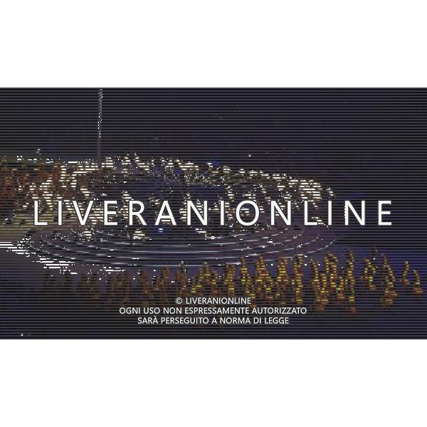 (120812) -- LONDON, Aug. 12, 2012 () -- Photo taken on August 12, 2012 shows the Olympic flame being extinguished gradually at the Closing Ceremony of the London 2012 Olympic Games at the Olympic Stadium in London, Britain. (/Wang Qingqin) (zgp) ©PHOTOSHOT/AGENZIA ALDO LIVERANI SAS - ITALY ONLY - CERIMONIA DI CHIUSURA DEI GIOCHI OLIMPICI, OLIMPIADI LONDRA 2012