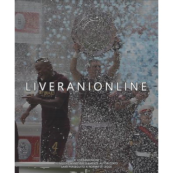 Manchester City\'s Aleksander Kolarov lifts the trophy . during the FA Community Shield between Chelsea and Manchester City at Villa Park in Birmingham on 12/08/2012. ©IPS Photo Agency.Thatched Cottage - Wretham - Thetford .Norfolk IP24 1RH - .TEL 01953 499403. -Personal mobile: 07973 308 835 . AG ALDO LIVERABI S A S ONLYITALY