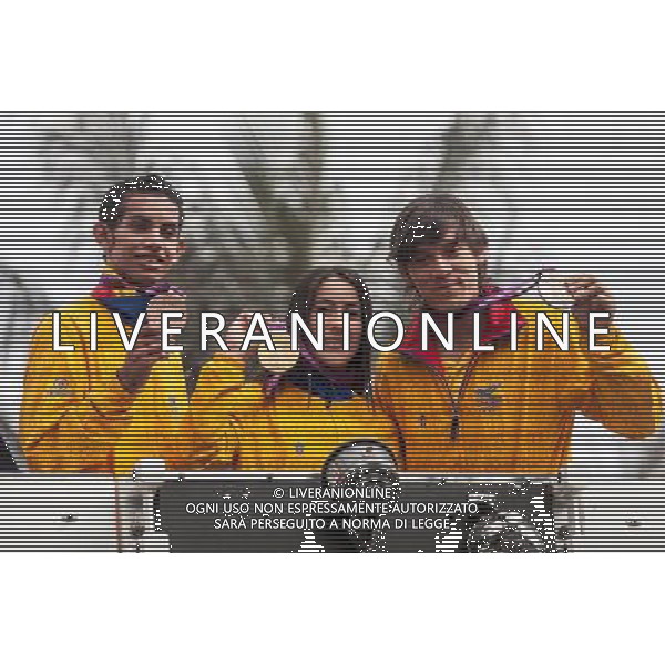 (120816) -- BOGOTA, Aug. 16, 2012, () -- Colombian Olympic medalists Oscar Munoz (L), Mariana Pajon (C) and Carlos Mario Oquendo (R), participate during a parade held to recive the arrival of the atlhetes from London 2012 Olympic Games, in Bogota, capital of Colombia, on August 15, 2012. (/Jhon Paz) (jp) (rh) (py) ©photosahot/Agenzia Aldo Liverani Sas - ITALY ONLY - Cerimonia di consegna del premio dell\'Ordine Boyaca agli atleti olimpici colombiani vincitori delle medaglie ai Giochi Olimpici di Londra 2012 a Casa Narino, a Bogota\', capitale della Colombia, il 15 agosto 2012.