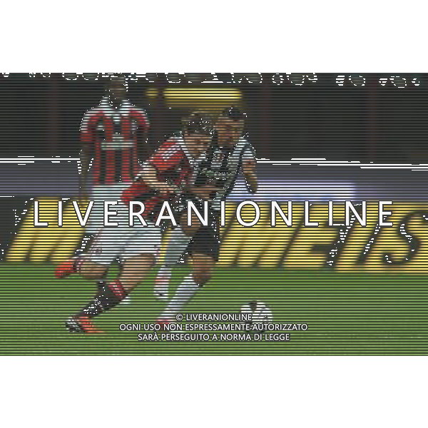 MILANO, 19-08-2012 / Œ©FOTO GIORGIO RAVEZZANI TROFEO LUIGI BERLUSCONI MILAN-JUVENTUS NELLA FOTO: RICCARDO MONTOLIVO - ARTURO VIDAL AGENZIA ALDO LIVERANI SAS