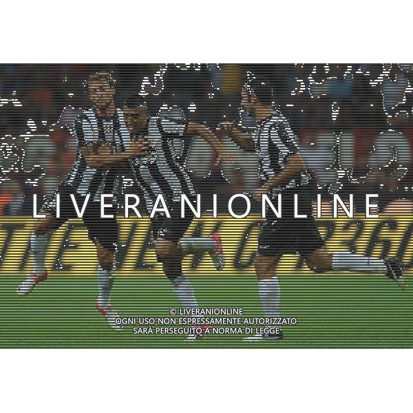 Trofeo Luigi Berlusconi 2012 Milano - 19.08.2012 Milan-Juventus Nella Foto:vidal esulta con marchisio e vucinic /Ph.Vitez-Ag. Aldo Liverani