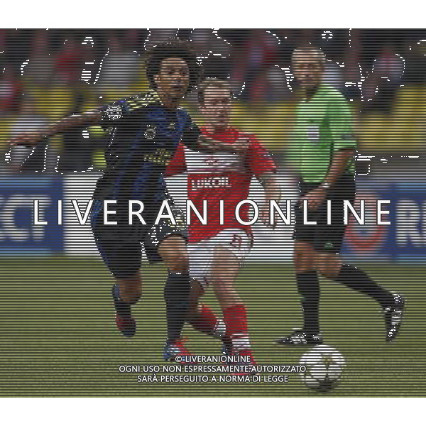 Champions League qualifying match between Spartak Moscow and Fenerbahce Istanbul at Luzhniki Stadium in Moscow, Russia on 2012/08/21 Pictured: Christian Baroni (L) of Fenerbahce and Aiden McGeady (R) of Spartak Moscow. pilka nozna sezon 2012/2012 liga mistrzow spartak moskwa FOT.SESKIM PHOTO/NEWSPIX.PL TURKEY, GERMANY, AUSTRIA AND UK OUT !!! LIGA TURECKA --- Newspix.pl AG ALDO LIVERANI S A S ONLY ITALY *** Local Caption *** www.newspix.pl mail us: info@newspix.pl call us: 0048 022 23 22 222 --- Polish Picture Agency by Ringier Axel Springer Poland