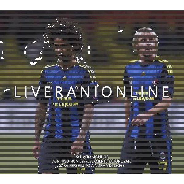 Champions League qualifying match between Spartak Moscow and Fenerbahce Istanbul at Luzhniki Stadium in Moscow, Russia on 2012/08/21 Match Scored: Spartak Moscow 2 - Fenerbahce 1 Pictured: Christian Baroni (L) and Milos Krasic (R) of Fenerbahce. pilka nozna sezon 2012/2012 liga mistrzow spartak moskwa FOT.SESKIM PHOTO/NEWSPIX.PL TURKEY, GERMANY, AUSTRIA AND UK OUT !!! --- Newspix.pl AG ALDO LIVERANI S A S ONLY ITALY *** Local Caption *** www.newspix.pl mail us: info@newspix.pl call us: 0048 022 23 22 222 --- Polish Picture Agency by Ringier Axel Springer Poland