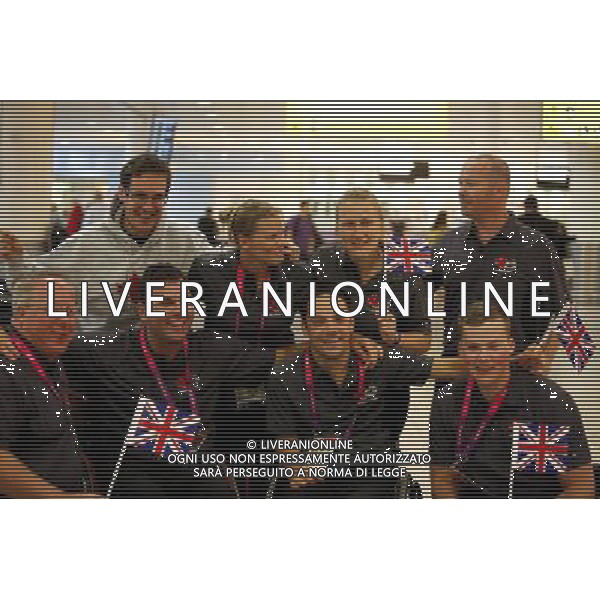 Members of the wheelchair rugby Canadian Paralympic team arrive to Heathrow Airport in London Britain 22 August 2012. The 2012 London Paralympic Games will take place from 29 of August to 09 September 2012. ©photoshot/AGENZIA ALDO LIVERANI SAS - ITALY ONLY - Arrivo degli atleti canadesi paralimpici all\'aeroporto di Heathrow a Londra, Regno Unito 22 agosto 2012 per i Giochi Paralimpici Paralimpiadi Londra 2012 che si svolgeranno dal 29 agosto al 09 settembre 2012.