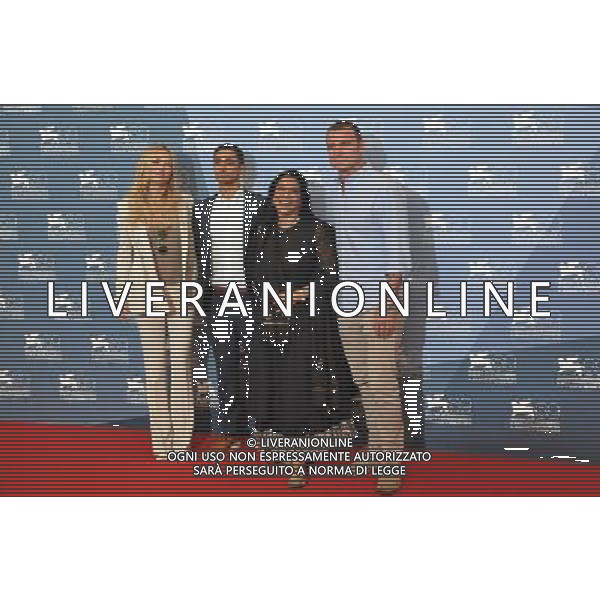 (120829) -- VENICE, Aug. 29, 2012 () -- Indian director Mira Nair(2nd R) and cast members pose for photos at the photocall of the opening film \'The Reluctant Fundamentalist\' ahead of the 69th Venice International Film Festival at Venice, Italy, Aug. 29, 2012. The 69th Venice International Film Festival will be inaugurated later Wednesday. (/Wang Qingqin) (rh) PHOTOSHOT/AG ALDO LIVERANI SAS - ITALY ONLY -