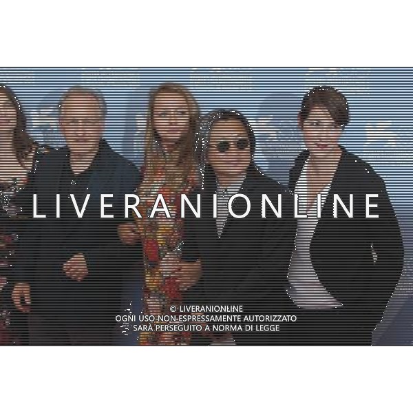 (120829) -- VENICE, Aug. 29, 2012 () -- Chinese Hongkong director Peter Ho-Sun Chan (2nd, R), jury member of \'VENEZIA 69\' (main competition section), poses for photos during a photocall at the 69th Venice Film Festival, in Venice, Italy, Aug. 29, 2012. The festival will last from Aug. 29 to Sep. 8, 2012. (/Gao Jing) PHOTOSHOT/AG ALDO LIVERANI SAS - ITALY ONLY -