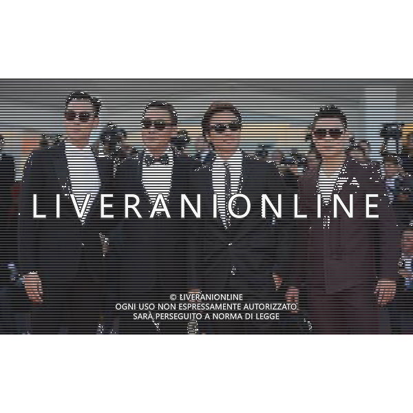 (120829) -- VENICE, Aug. 29, 2012 () -- Chinese Hong Kong director Stephen Fung Tak-lun (2nd R), together with actors Tony Leung Ka-fai (2nd L), Eddie Peng (1st L) and Yuan Xiaochao pose on the red carpet of the Venice Film Festival in Venice, Italy, Aug. 29, 2012. The 69th Venice International Film Festival opened here late Wednesday. (/Wang Qingqin) PHOTOSHOT/AG ALDO LIVERANI SAS - ITALY ONLY -