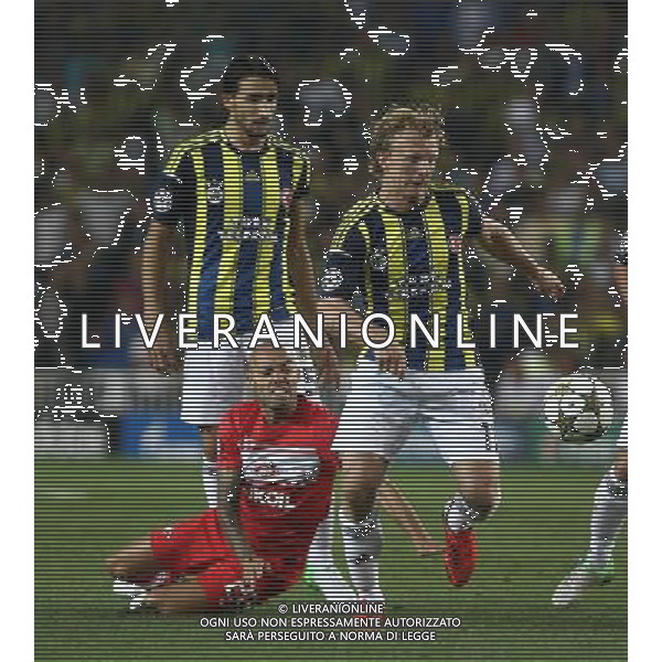 Champions League play off match between Fenerbahce and Spartak Moscow at Sukru Saracoglu Stadium in Istanbul, Turkey on 2012/08/29 Pictured: Demy de Zeeuw of Spartak Moscow and Dirk Kuyt of Fenerbahce. PHOTOSHOT/AG ALDO LIVERANI SAS - ITALY ONLY -