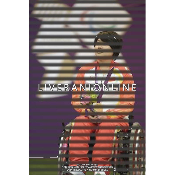 (120830) -- LONDON, Aug. 30, 2012 () -- Zhang Cuiping of China attends the awarding ceremony for the Women\'s R2-10m Air Rifle Standing-SH1 shooting event at London 2012 Paralympic Games in London, Britain, on Aug. 30, 2012. Zhang took the gold medal with 500.9 rings. (/Li Jundong) (zc) /photoshot/AG ALDO LIVERANI SAS ITALY ONLY -