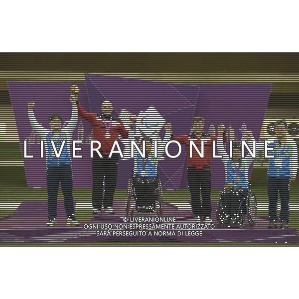 (120830) -- LONDON, Aug. 30, 2012 () -- Gold medalist, Park Seakyun (C) of South Korea, silver medalist, Yamac M Korhan (2nd L) of Turkey, bronze medalist, Lee Juhee (2nd R) celebrate during the awarding ceremony for the final of the Men\'s P1-10m Air Pistol-SH1 shooting event at London 2012 Paralympic Games in London, Britain, on Aug. 30, 2012. (/Li Jundong) (cc) /photoshot/AG ALDO LIVERANI SAS ITALY ONLY -