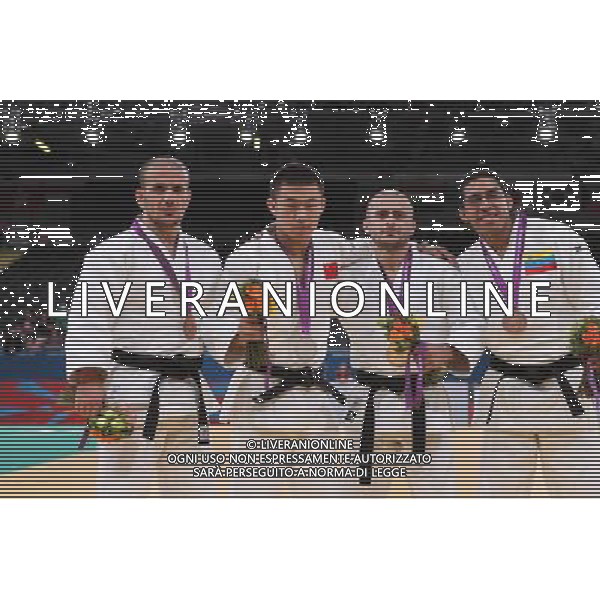 (120831) -- LONDON, Aug. 31, 2012 () -- Gold medalist Davyd Khorava (2nd R) of Ukraine poses for photos during the awarding ceremony of the men\'s 66kg judo final at London 2012 Paralympic Games in London, Britain, on Aug. 30, 2012. (/Hou Jun) /photoshot/AG ALDO LIVERANI SAS ITALY ONLY -