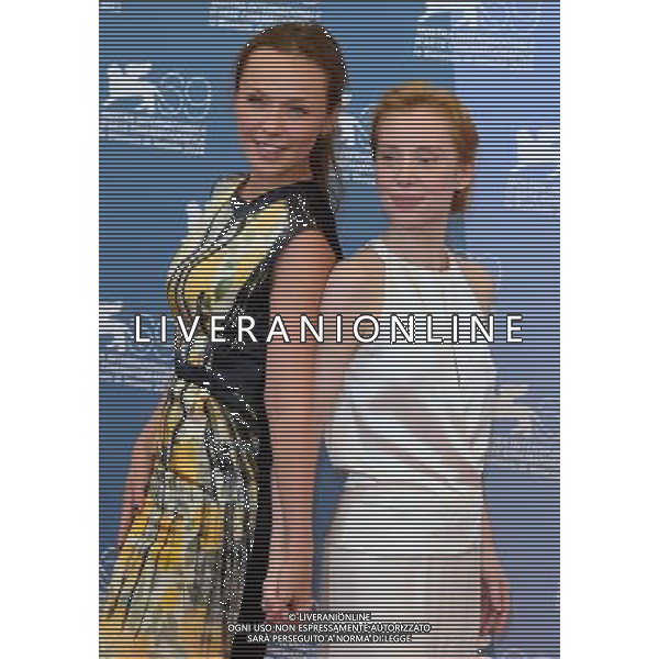 (120830) -- VENICE, Aug. 30, 2012 () -- Actresses Franziska Petri (R) and Albina Dzhanabaeva pose for photos at the photocall of Russian film \'Izmena (Betrayal)\' at the 69th Venice International Film Festival in Venice, Italy, Aug. 30, 2012. (/Wang Qingqin) (zy) photoshot/AG ALDO LIVERANI SAS - ITALY ONLY -
