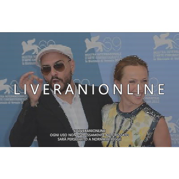 (120830) -- VENICE, Aug. 30, 2012 () -- Russian director Kirill Serebrennikov (L) and actress Albina Dzhanabaeva pose for photos at the photocall of his film \'Izmena (Betrayal)\' at the 69th Venice International Film Festival in Venice, Italy, Aug. 30, 2012. (/Wang Qingqin) (zy) photoshot/AG ALDO LIVERANI SAS - ITALY ONLY -