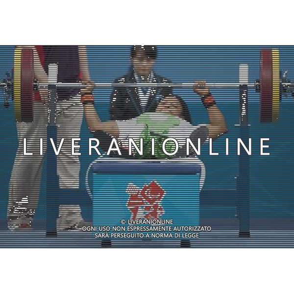 (120831) -- LONDON, Aug. 31, 2012 () -- Ivory Nwokorie of Nigeria compets during the women\'s -44 kg final of the powerlifting event at the London 2012 Paralympic Games, Aug. 31, 2012. Nwokorie claimed the title of the event with 109kg.(/Liu Siu Wai) (zc) AG ALDO LIVERANI S A S ONLY ITALY