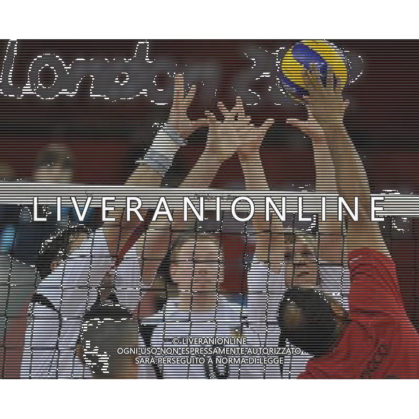 (120831) -- LONDON, Aug. 31, 2012 () -- Stefan Haehnlein (Back R) of Germany and his teammate block in the Men\'s Sitting Volleyball match against Morocco at London 2012 Paralympic Games, in London, Britain, on Aug. 31, 2012. Germany won 3-0. (/Chen Yehua) (cc) AG ALDO LIVERANI S A S ONLY ITALY