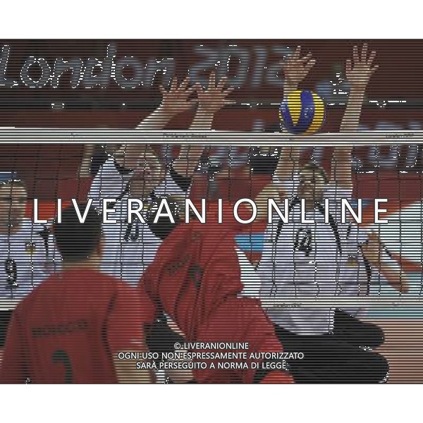 (120831) -- LONDON, Aug. 31, 2012 () -- Christoph Herzog (Back L) and Torben Schiewe (Back R) of Germany blocks in the Men\'s Sitting Volleyball match against Morocco at London 2012 Paralympic Games, in London, Britain, on Aug. 31, 2012. Germany won 3-0. (/Chen Yehua) (cc) AG ALDO LIVERANI S A S ONLY ITALY