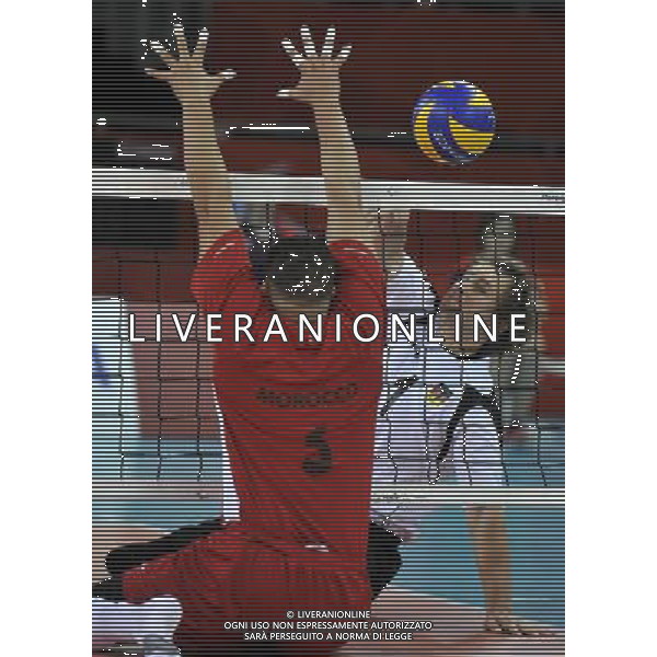 (120831) -- LONDON, Aug. 31, 2012 () -- Alexander Schiffler (R) of Germany blocks in the Men\'s Sitting Volleyball match against Morocco at London 2012 Paralympic Games, in London, Britain, on Aug. 31, 2012. Germany won 3-0. (/Chen Yehua) (cc) AG ALDO LIVERANI S A S ONLY ITALY