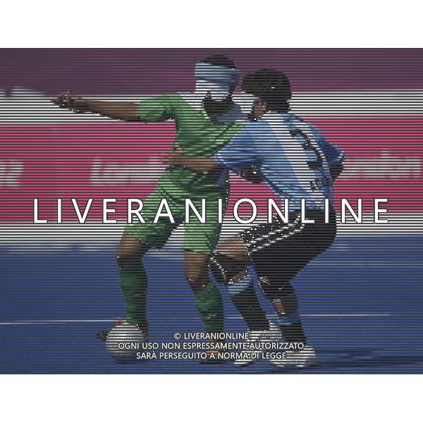 (120901) -- LONDON, Sept. 1, 2012 () -- Federico Acardi (R) of Argentina vies for the ball during the men\'s football 5-a-side preliminaries Pool A match against Iran at London 2012 Paralympic Games in London, Aug. 31, 2012. (/Li Jundong) AG ALDO LIVERANI S A S ONLY ITALY