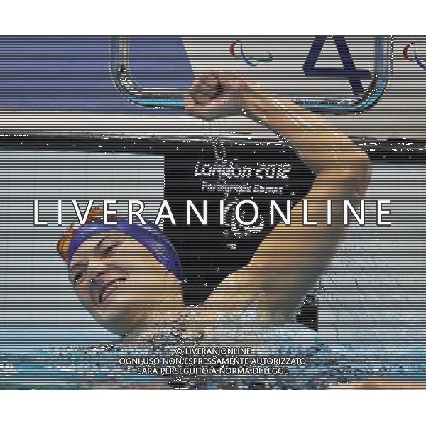 (120901) -- LONDON, Sept. 1, 2012 () -- Gold medalist Natalia Prologaieva of Ukraine celebrates after the women\'s 200m individual medley SM5 final at London 2012 Paralympic Games in London, Aug. 31, 2012. (/Yang Shiyao) AG ALDO LIVERANI S A S ONLY ITALY