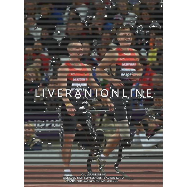 (120901) -- LONDON, Sept. 1, 2012 () -- Gold medalist Markus Rehm (R) and silver medalist Wojtek Czyz of Germany celebrate after the men\'s long jump F42/44 at London 2012 Paralympic Games in London, Aug. 31, 2012. (/Yang Lei) AG ALDO LIVERANI S A S ONLY ITALY