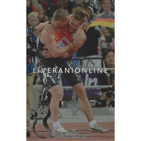 (120901) -- LONDON, Sept. 1, 2012 () -- Gold medalist Markus Rehm (R) and silver medalist Wojtek Czyz of Germany celebrate after the men\'s long jump F42/44 at London 2012 Paralympic Games in London, Aug. 31, 2012. (/Yang Lei) AG ALDO LIVERANI S A S ONLY ITALY